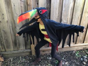 Photo of Sophy wearing the finished talking fiery-billed aracari costume.